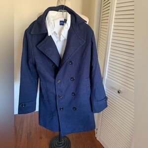 Man’s wool blend peacoat navy blue, no size label pit to pit is 21”